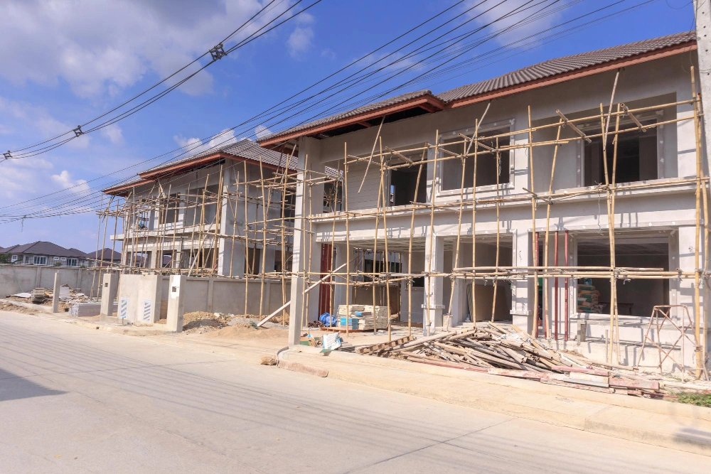 soft story building undergoing seismic retrofit with steel frame installation in Los Angeles